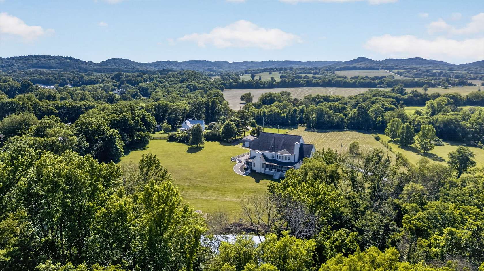 15.9 Acres of Recreational Land with Home for Sale in College Grove, Tennessee