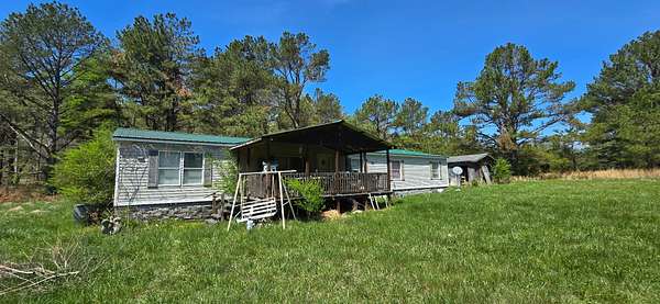 7.58 Acres of Land with Home for Sale in Nunnelly, Tennessee