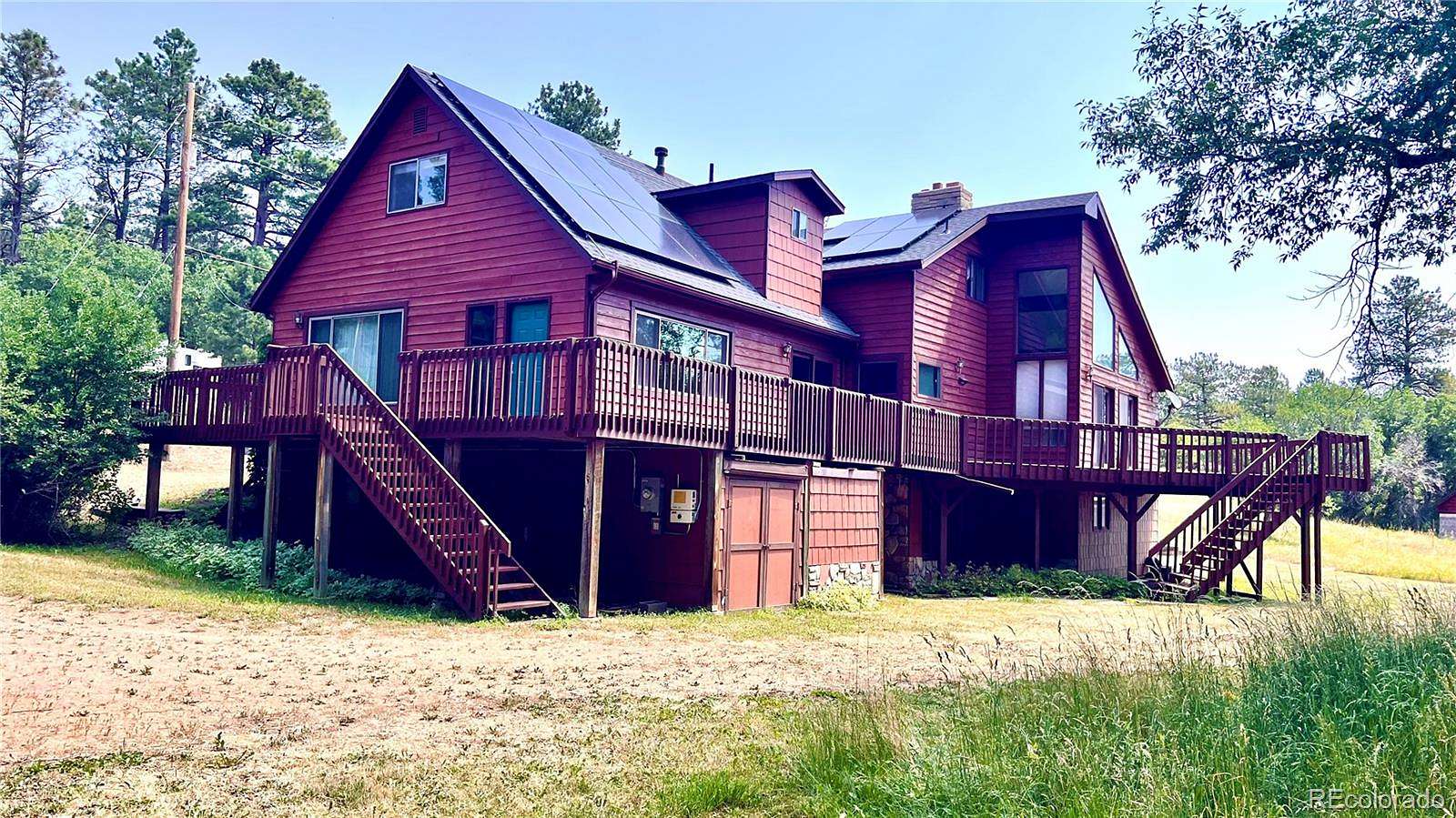 6.46 Acres of Land with Home for Sale in Palmer Lake, Colorado