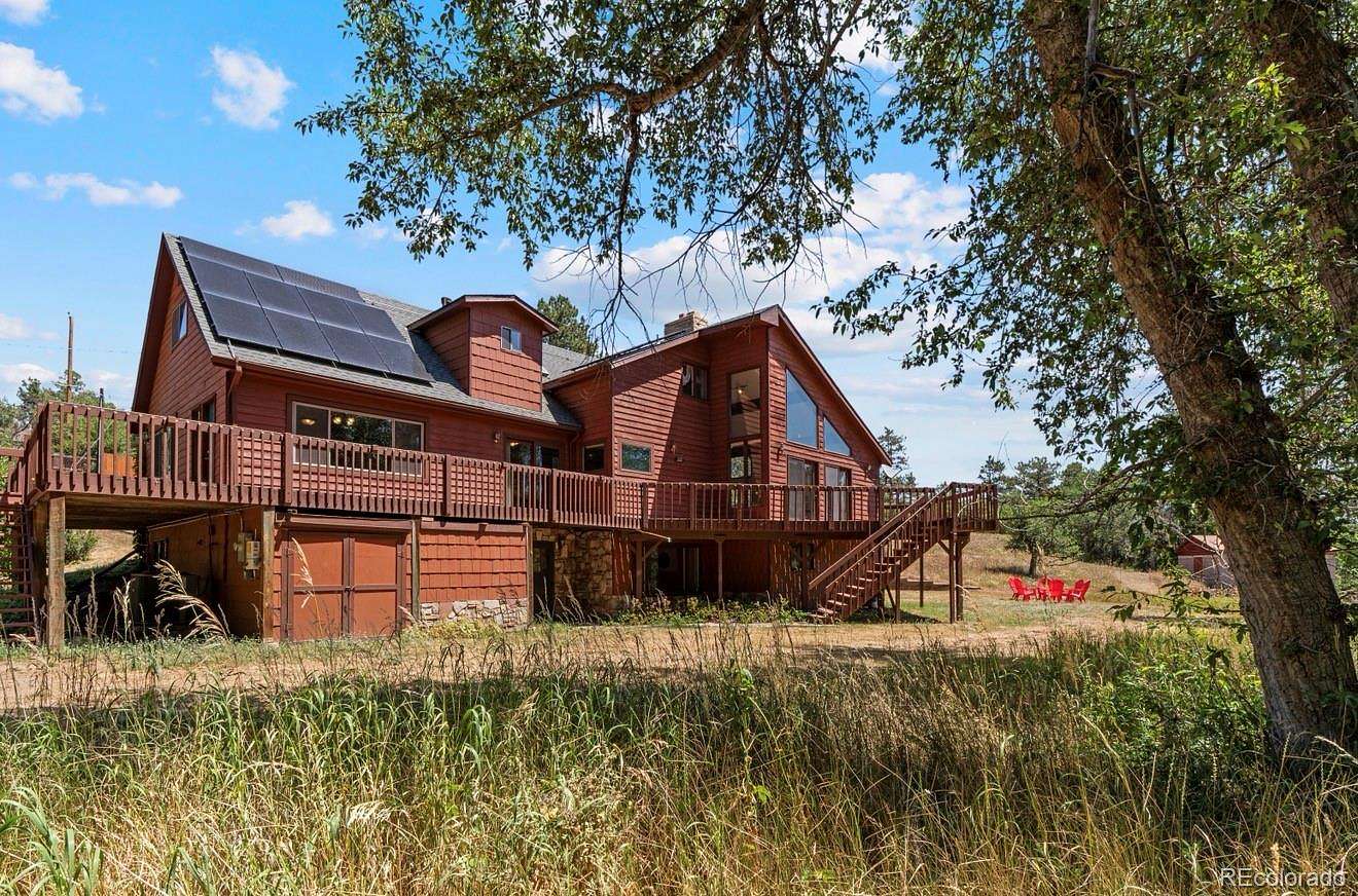 6.46 Acres of Land with Home for Sale in Palmer Lake, Colorado