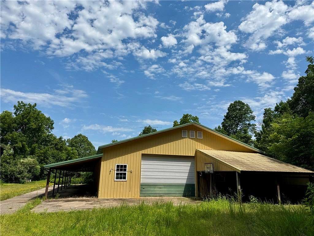 23 Acres of Recreational Land with Home for Sale in Rogers, Arkansas