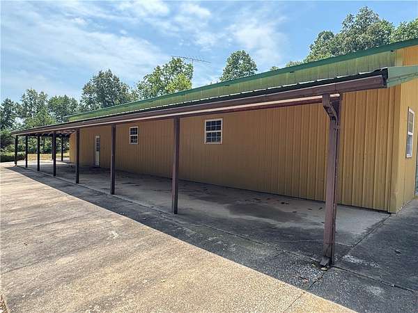 23 Acres of Recreational Land with Home for Sale in Rogers, Arkansas