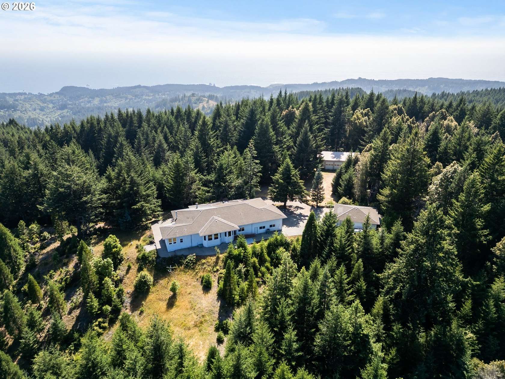 80.5 Acres of Recreational Land with Home for Sale in Brookings, Oregon