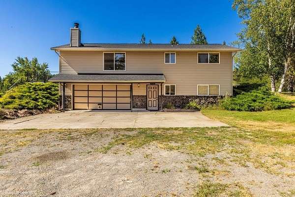 11.3 Acres of Land with Home for Sale in Spokane, Washington