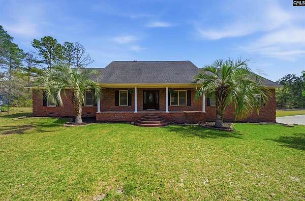9.3 Acres of Land with Home for Sale in Gaston, South Carolina