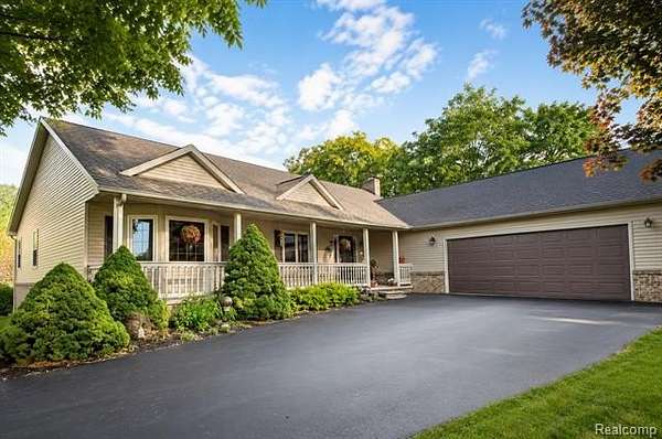 10.5 Acres of Land with Home for Sale in Wales Township, Michigan