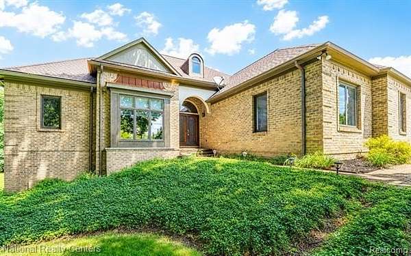 1.5 Acres of Land with Home for Sale in Clarkston, Michigan