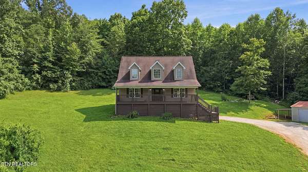 4.35 Acres of Land with Home for Sale in Rocky Top, Tennessee