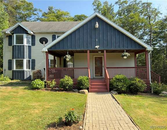 5.28 Acres of Land with Home for Sale in Colden, New York