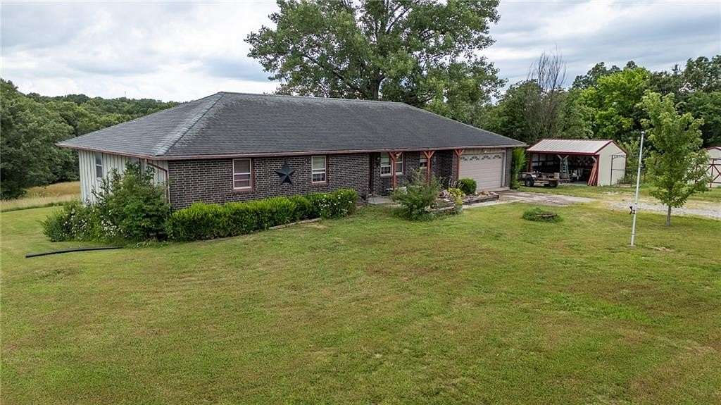 15 Acres of Recreational Land with Home for Sale in Rayville, Missouri