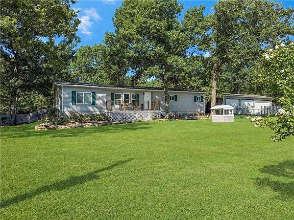 4.88 Acres of Land with Home for Sale in Warsaw, Missouri