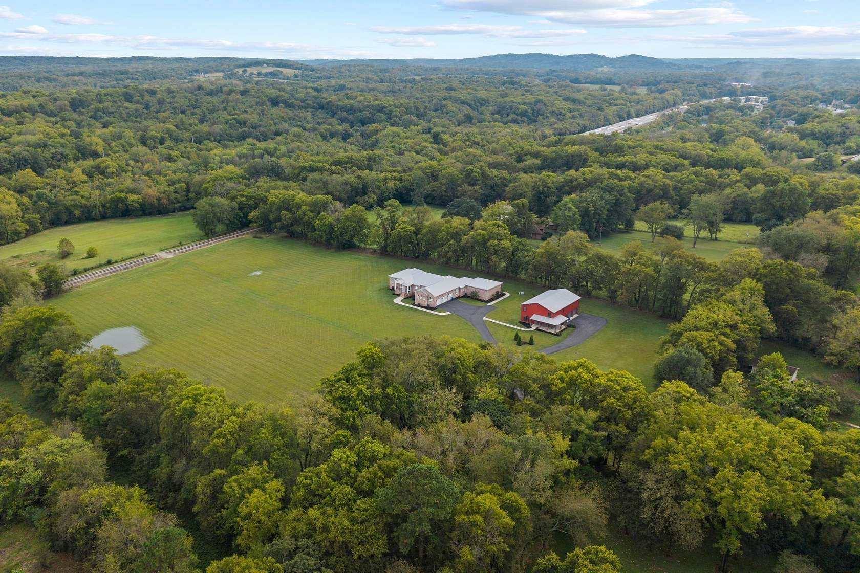 15.5 Acres of Land with Home for Sale in Mount Pleasant, Tennessee