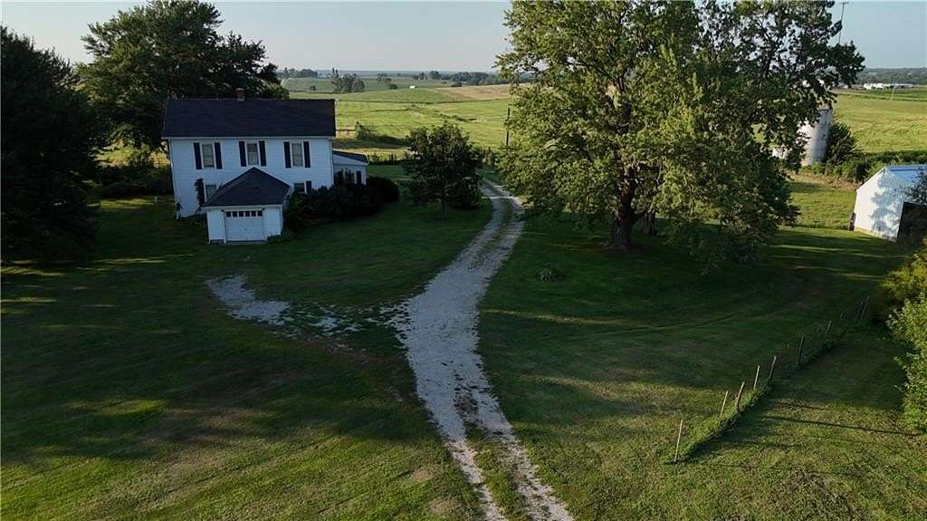 80 Acres of Agricultural Land with Home for Sale in Gower, Missouri