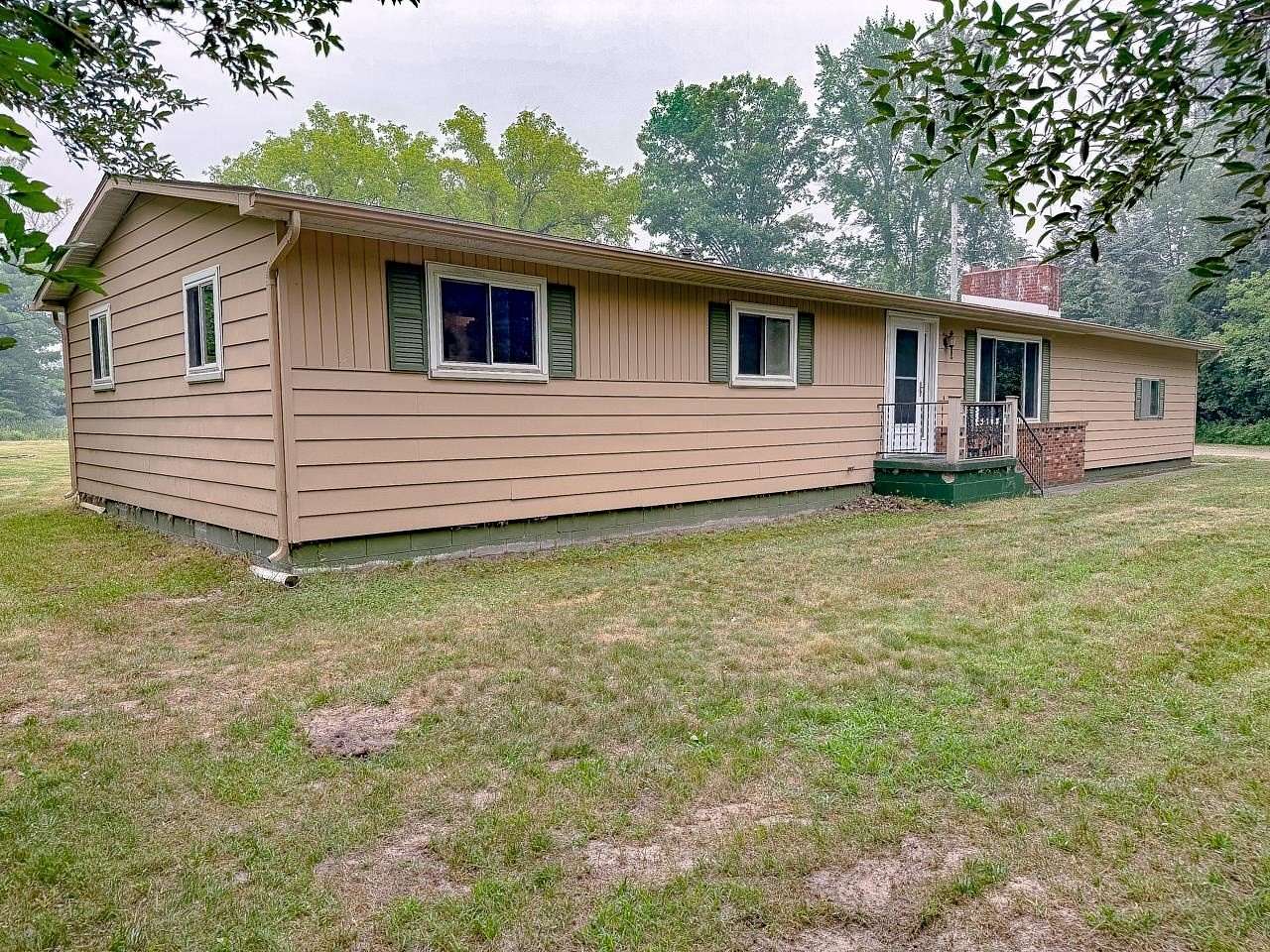 10 Acres of Land with Home for Sale in Coleman, Michigan