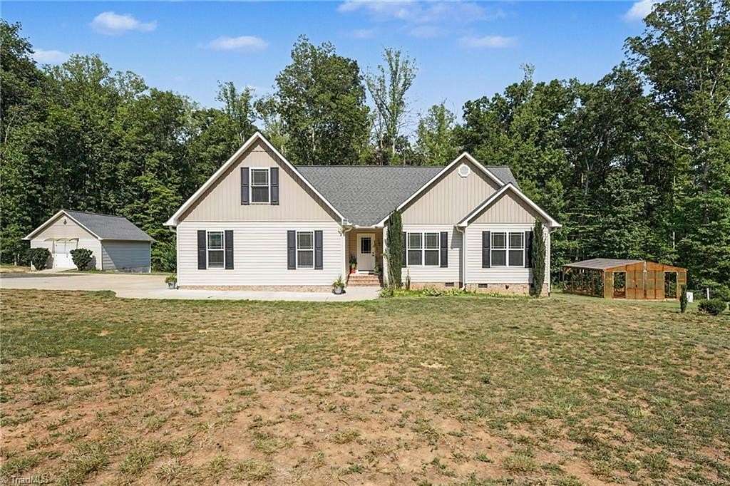 3 Acres of Land with Home for Sale in Summerfield, North Carolina