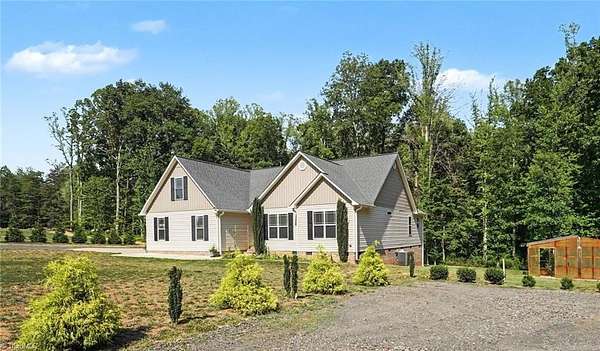 3 Acres of Land with Home for Sale in Summerfield, North Carolina