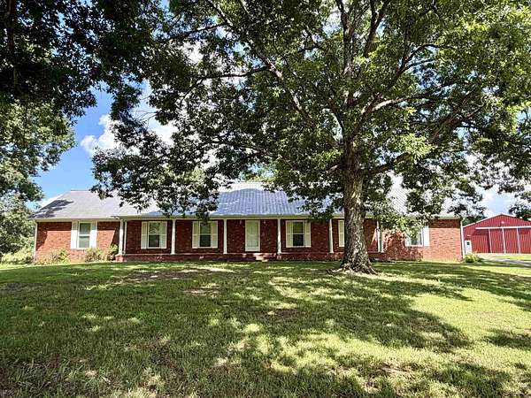 25.4 Acres of Agricultural Land with Home for Sale in Somerville, Tennessee