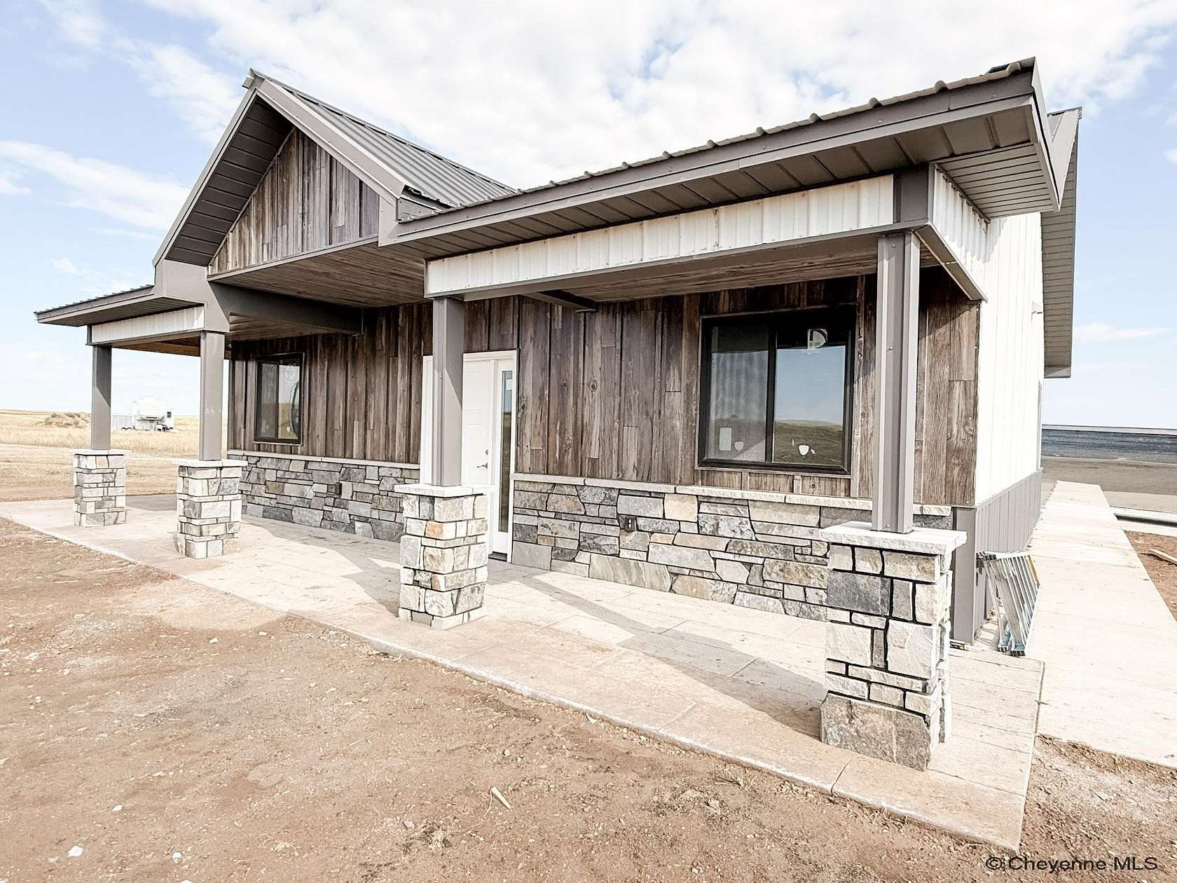 5.25 Acres of Land with Home for Sale in Pine Bluffs, Wyoming