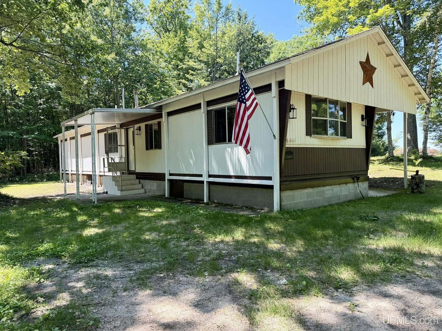 2 Acres of Land with Home for Sale in Garden, Michigan