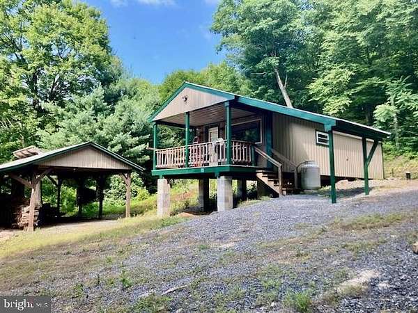 12.7 Acres of Recreational Land with Home for Auction in Belleville, Pennsylvania