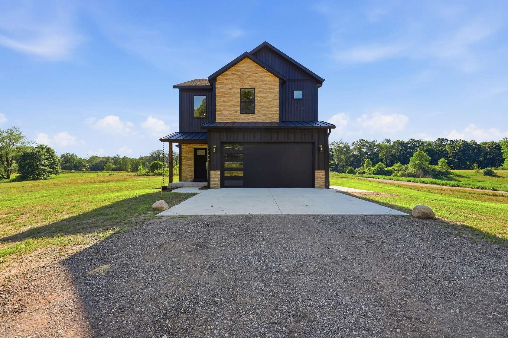 2.25 Acres of Land with Home for Sale in Rockford, Michigan