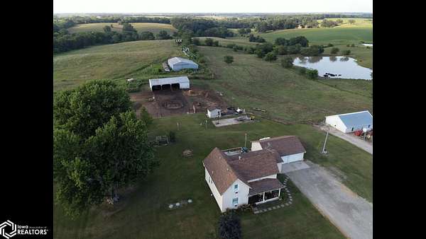 81.9 Acres of Agricultural Land with Home for Sale in Bloomfield, Iowa