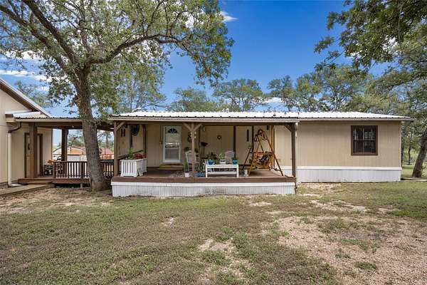 5.55 Acres of Land with Home for Sale in Cedar Creek, Texas