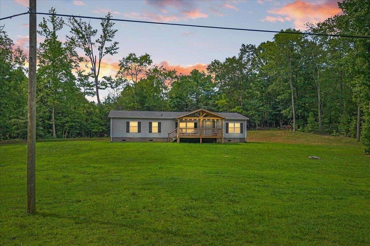1.66 Acres of Land with Home for Sale in Ten Mile, Tennessee