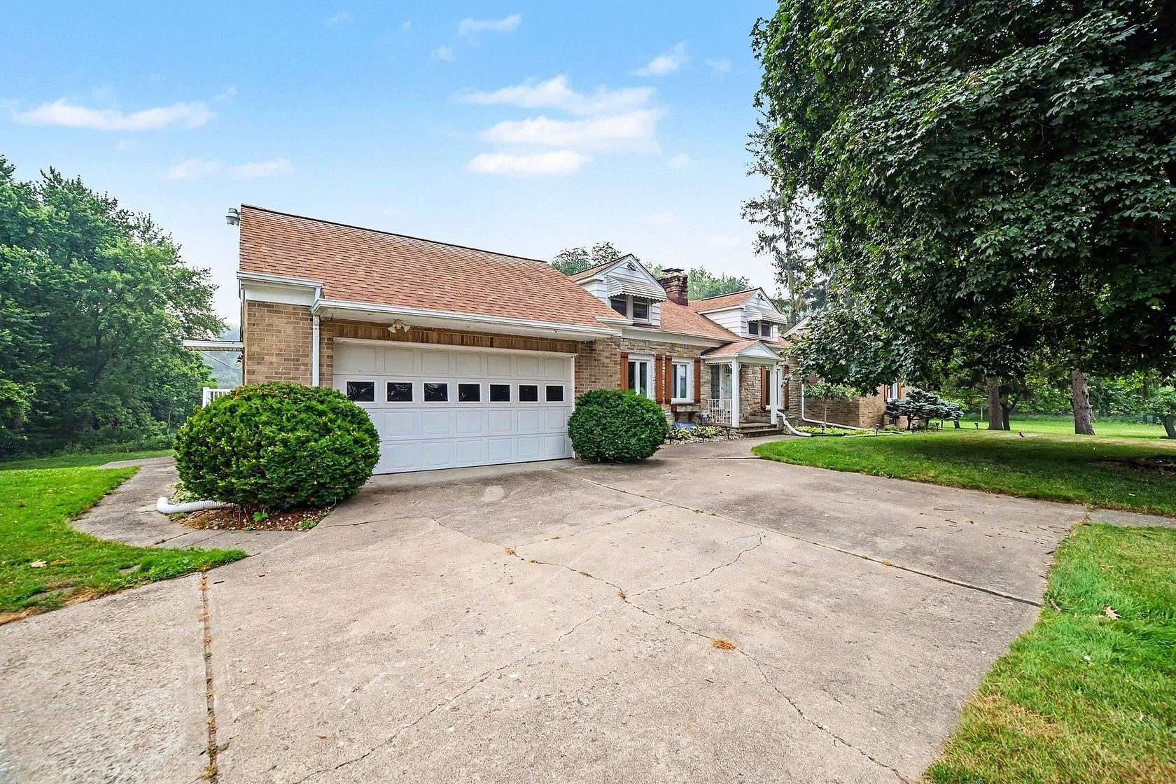 3.78 Acres of Land with Home for Sale in Saginaw, Michigan