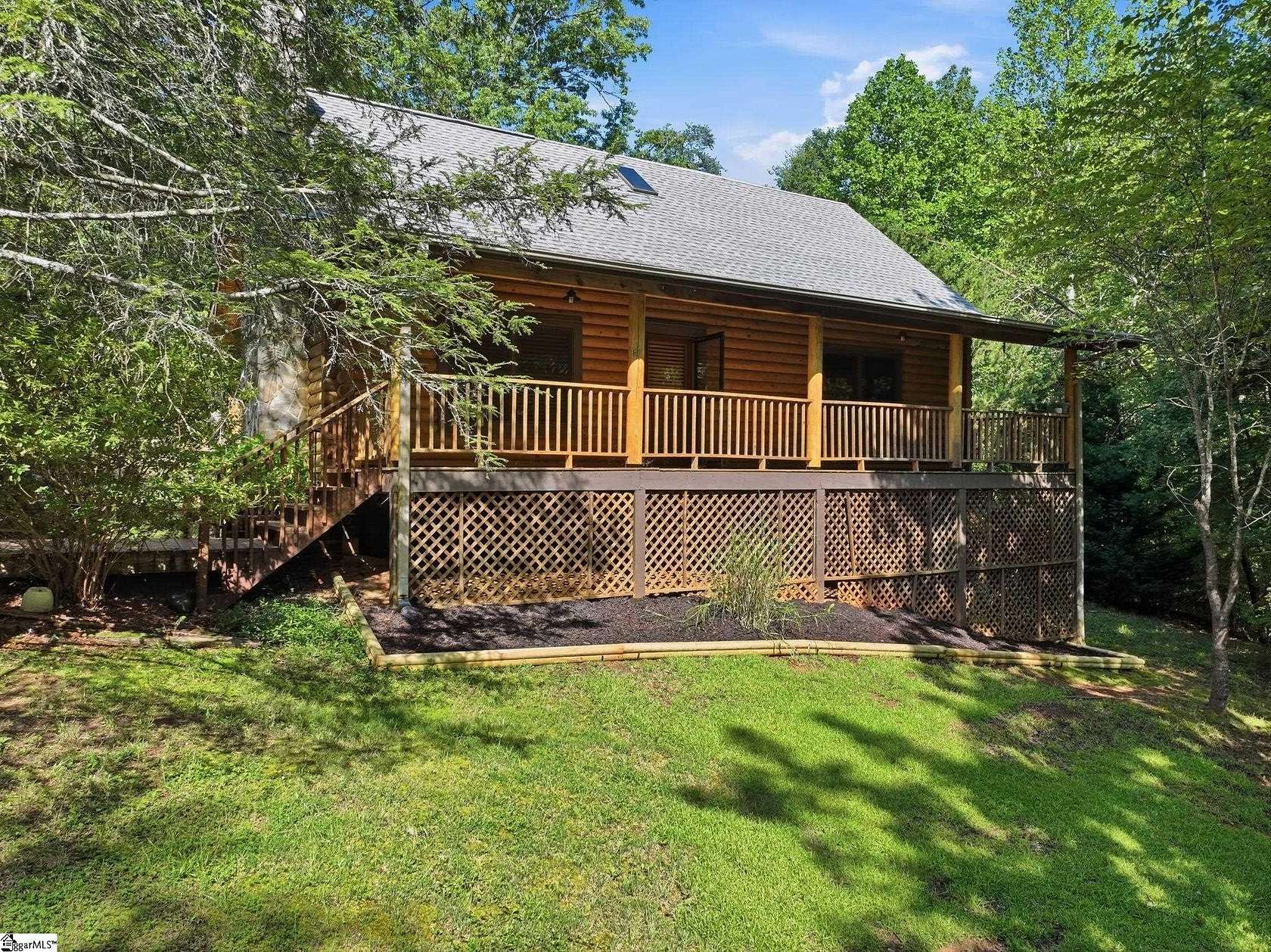 6.7 Acres of Land with Home for Sale in Marietta, South Carolina