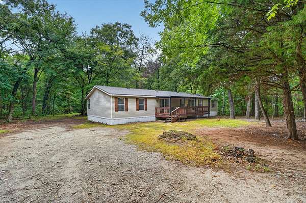 4 Acres of Land with Home for Sale in Quinlan, Texas