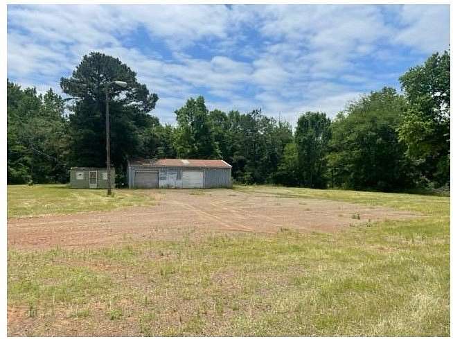 4.75 Acres of Improved Commercial Land for Lease in Lone Star, Texas