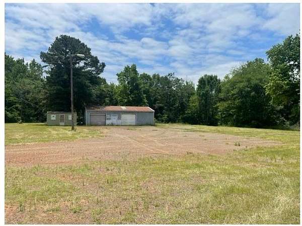 4.75 Acres of Improved Commercial Land for Lease in Lone Star, Texas