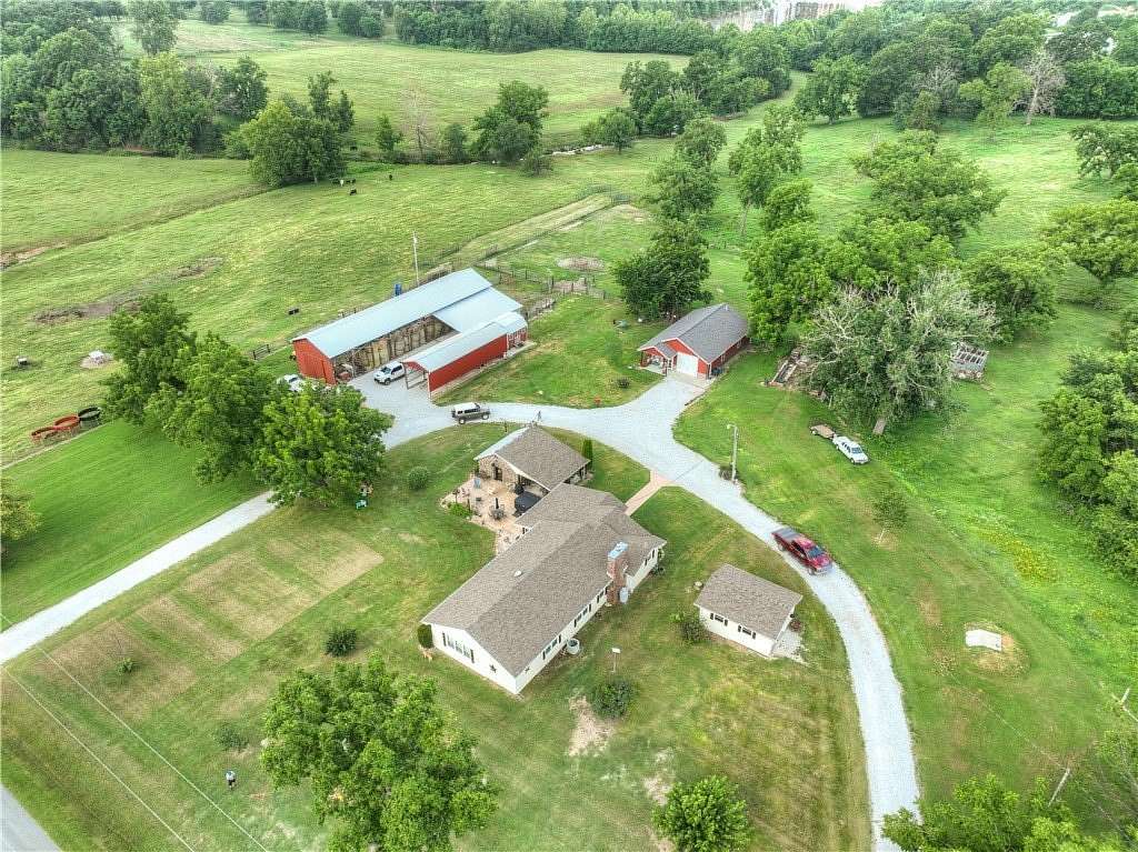 6 Acres of Land with Home for Auction in Neosho, Missouri