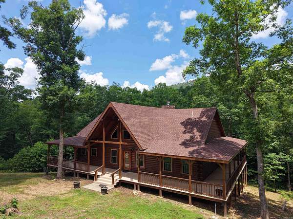 16.9 Acres of Land with Home for Sale in Mena, Arkansas
