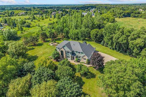 14.4 Acres of Land with Home for Sale in Greenfield, Minnesota