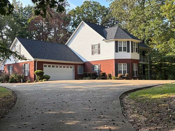 9.7 Acres of Land with Home for Sale in Grenada, Mississippi