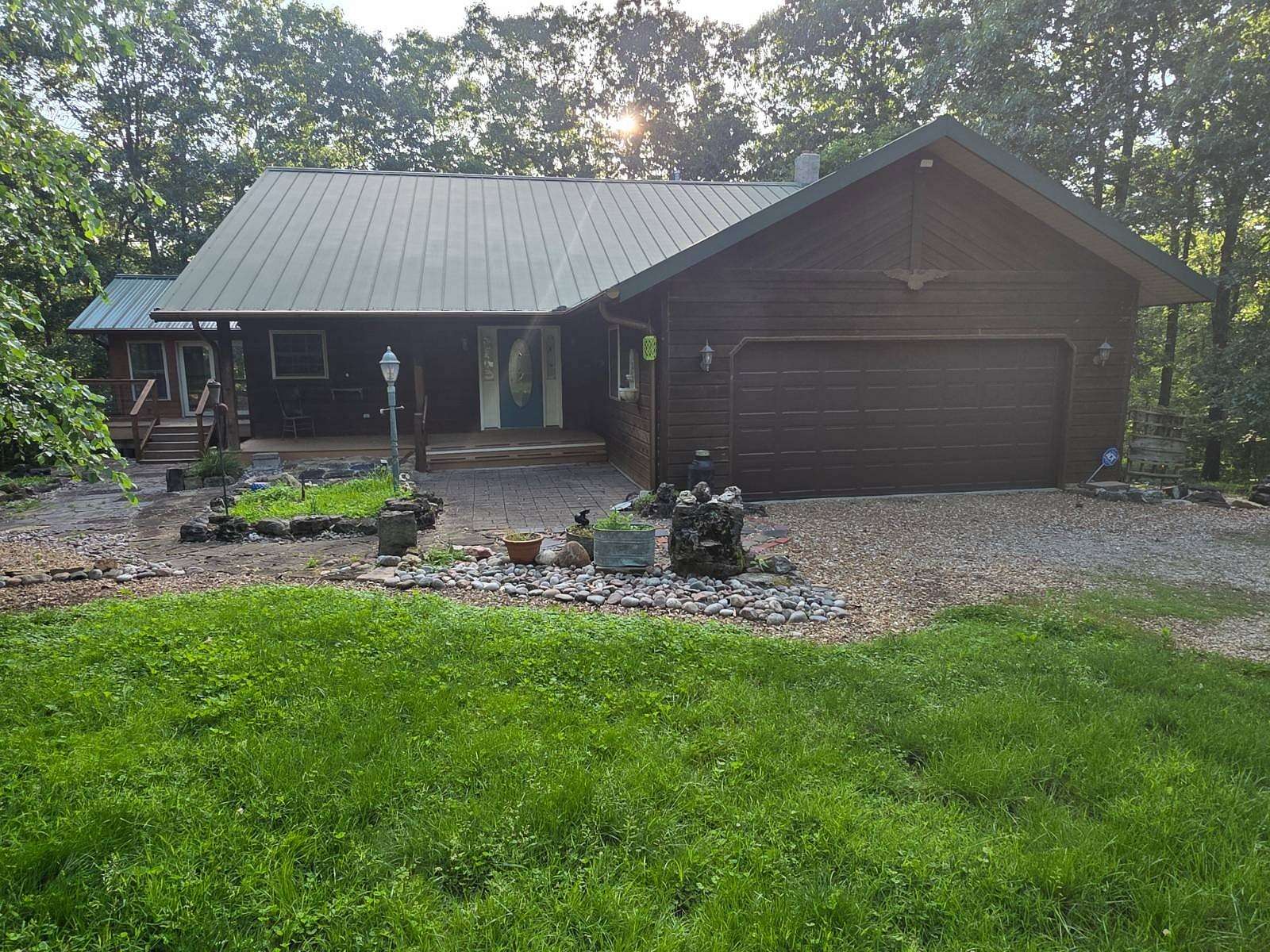 10 Acres of Land with Home for Sale in Rogersville, Missouri