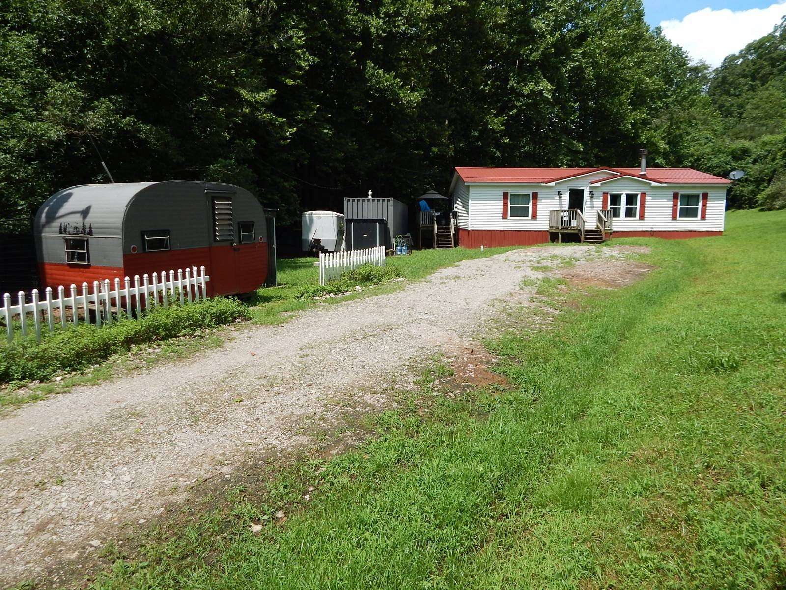 63 Acres of Recreational Land with Home for Sale in Cairo, West Virginia