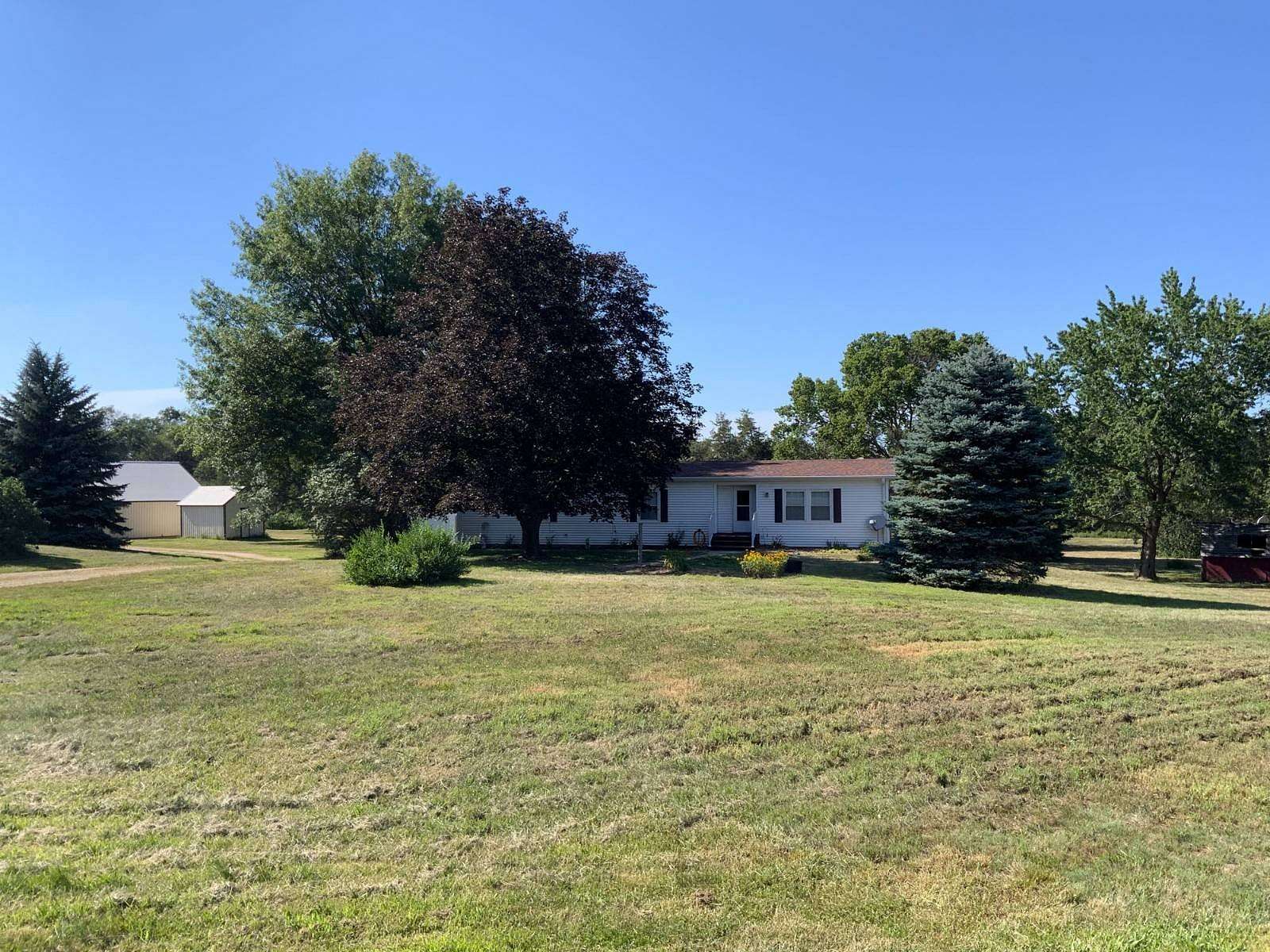 7 Acres of Land with Home for Sale in Orchard, Nebraska