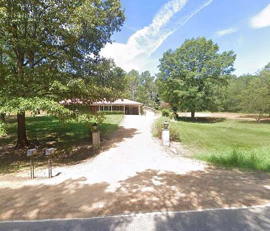 4.1 Acres of Land with Home for Auction in Coffeeville, Mississippi