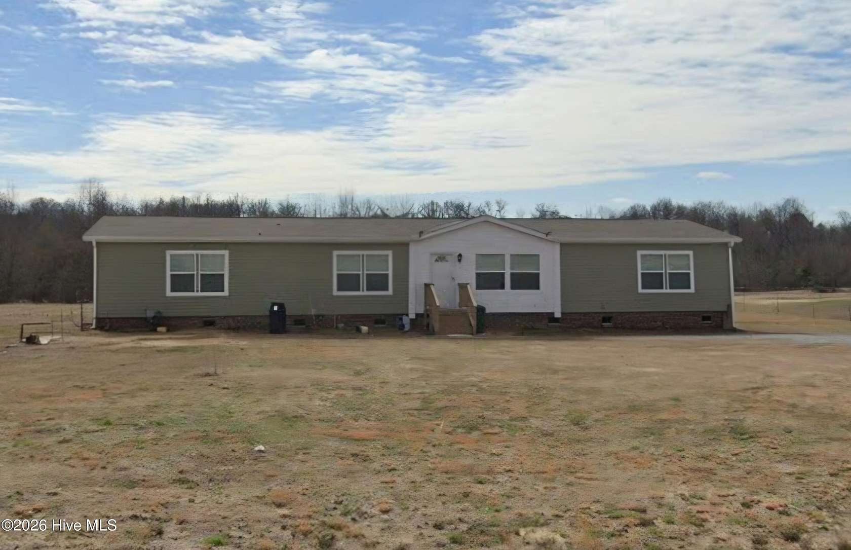 5.85 Acres of Land with Home for Sale in Clinton, North Carolina
