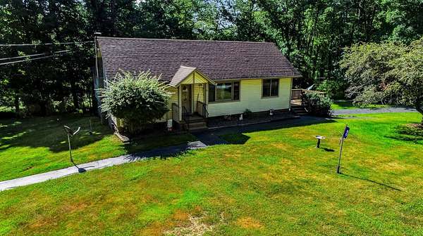 4.77 Acres of Land with Home for Sale in Yulan, New York