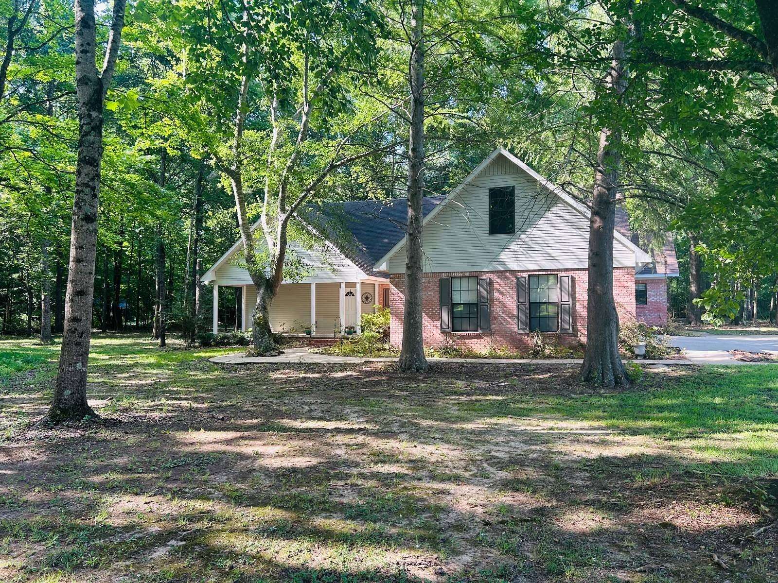 1.5 Acres of Land with Home for Sale in Grenada, Mississippi