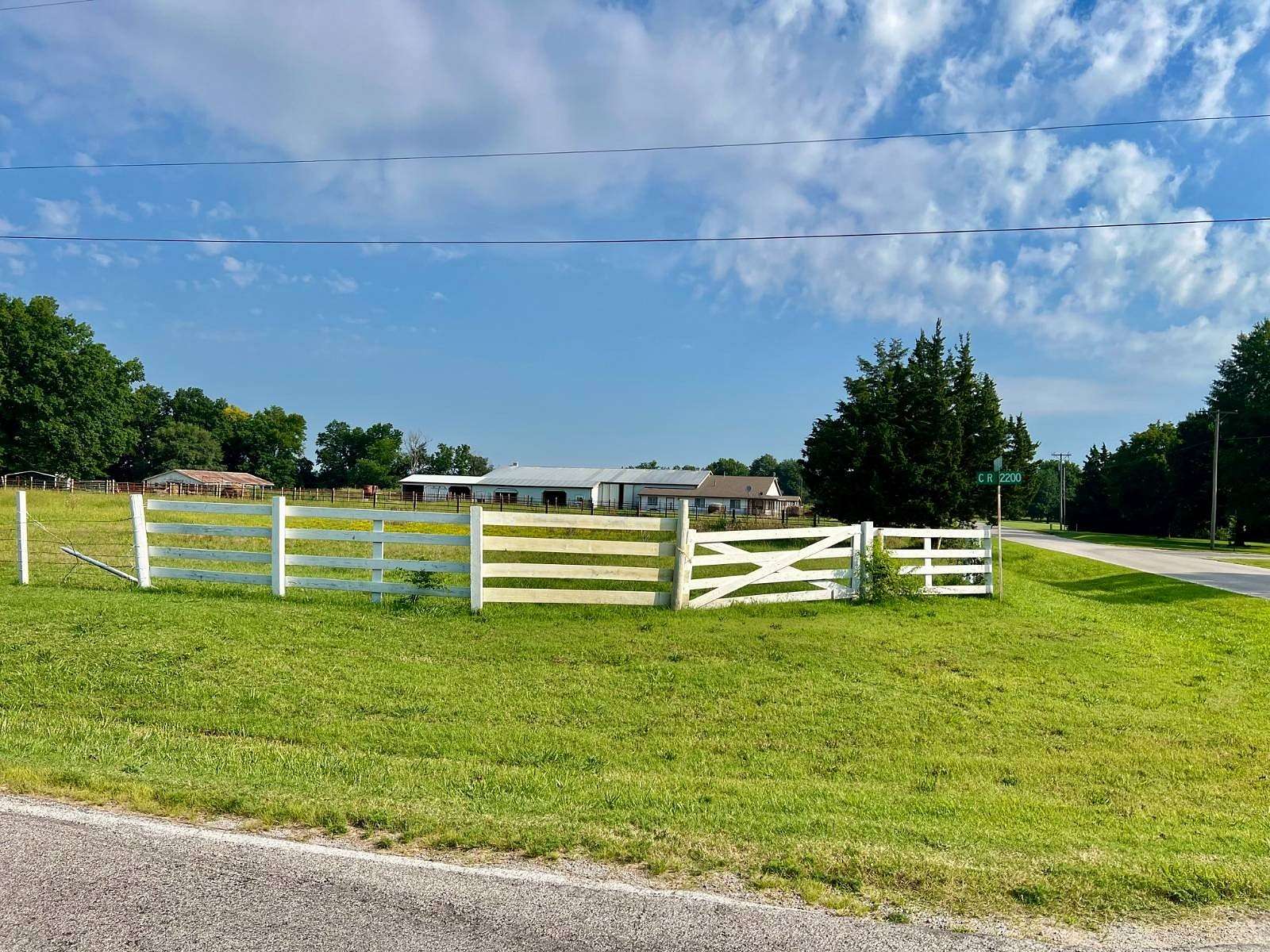 23.6 Acres of Land with Home for Sale in Coffeyville, Kansas