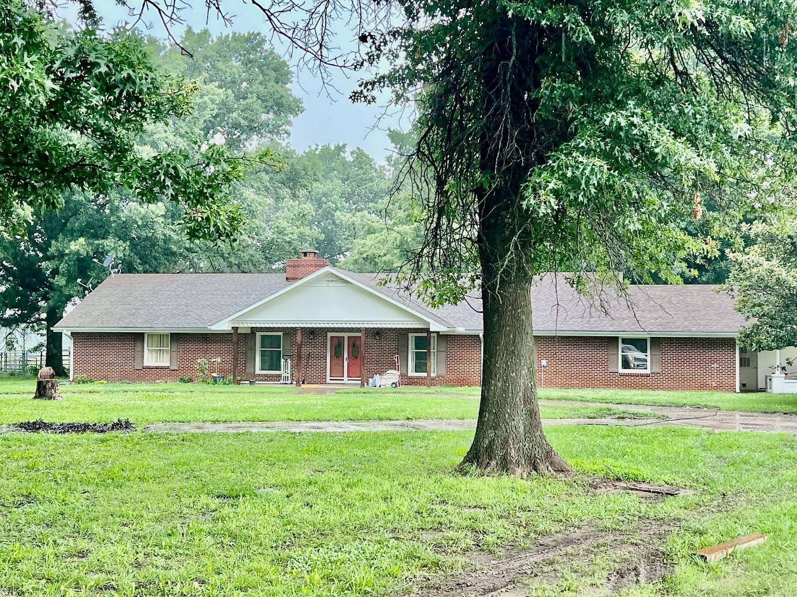 23.6 Acres of Land with Home for Sale in Coffeyville, Kansas