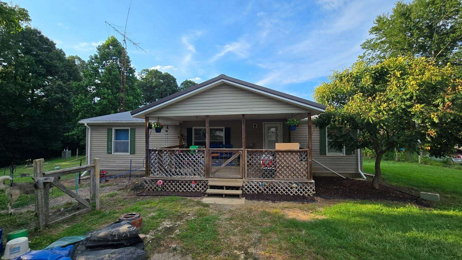 5 Acres of Land with Home for Sale in Providence, Kentucky