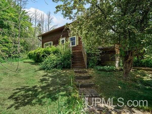 20 Acres of Land with Home for Sale in Skandia, Michigan