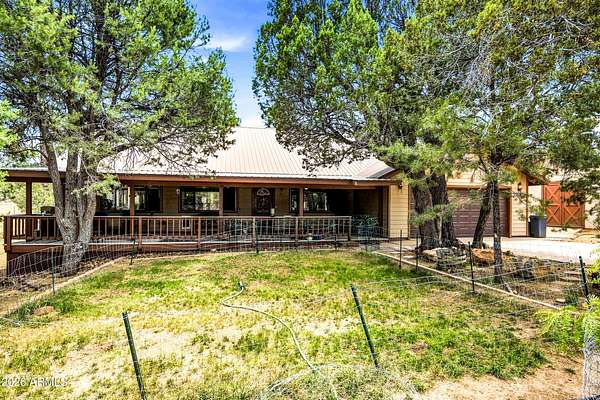 2.36 Acres of Land with Home for Sale in Overgaard, Arizona