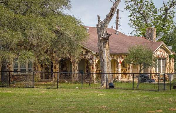 220 Acres of Land with Home for Sale in Luling, Texas